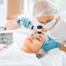 “Dermatologist examining patient and recommending medical grade skincare treatments”