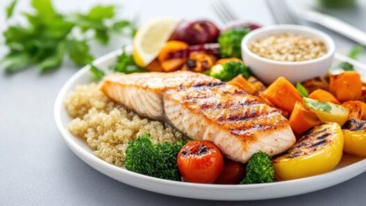 Healthy pescatarian meal with salmon, vegetables, and quinoa.