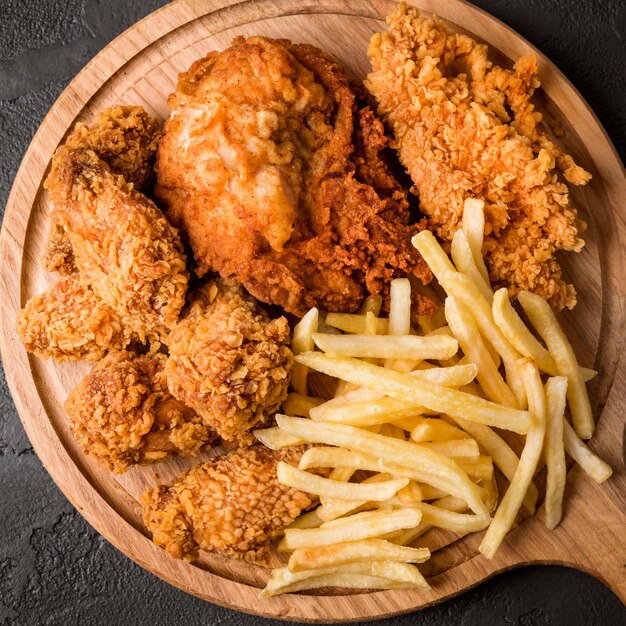 Fried chicken, burgers, and fries as examples of the worst foods to eat with diarrhea