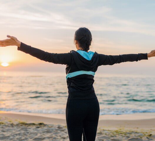 Morning stretching with natural sunlight to boost energy